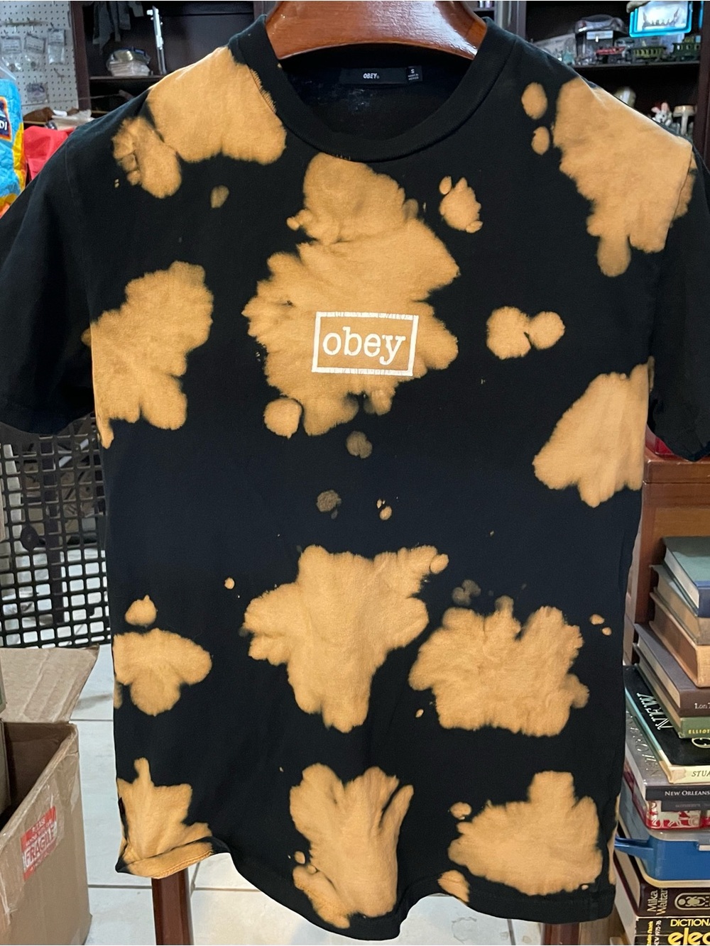 Obey Black Tee with Orange Bleach-Spot Logo